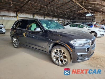 Czwarte zdjęcie samochodu z boku: 2017 BMW X5 XDR40E VIN:5UXKT0C58H0S80607 - miniatura
