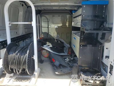 Zdjęcie 10 z 13 samochodu: 2018 FORD TRANSIT T-150 VIN:1FTYE1ZM0JKA64271 - miniatura