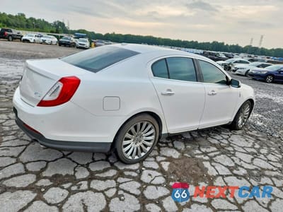 Trzecie zdjęcie samochodu z tyłu: 2013 LINCOLN MKS VIN:1LNHL9DK7DG610349 - miniatura