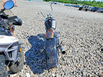 Czwarte zdjęcie samochodu z boku: 2011 HARLEY-DAVIDSON FXDWG VIN:1HD1GP413BC321820 - miniatura