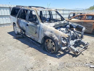 Czwarte zdjęcie samochodu z boku: 2014 LINCOLN NAVIGATOR L VIN:5LMJJ3J53EEL00647 - miniatura