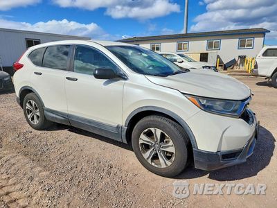 Czwarte zdjęcie samochodu z boku: 2017 HONDA CR-V LX VIN:2HKRW5H39HH403572 - miniatura