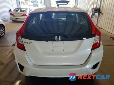 Zdjęcie 6 z 12 samochodu: 2016 HONDA FIT LX VIN:JHMGK5H59GS013834 - miniatura