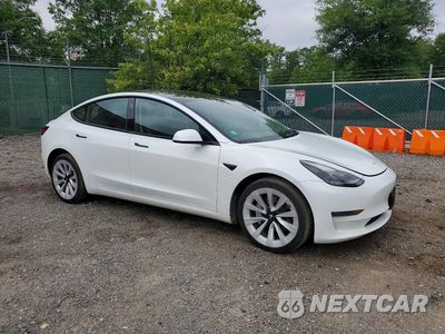 Czwarte zdjęcie samochodu z boku: 2023 TESLA MODEL 3 VIN:5YJ3E1EA8PF451808 - miniatura
