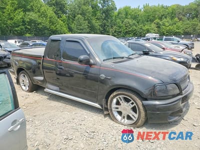 Czwarte zdjęcie samochodu z boku: 2000 FORD F150 VIN:2FTRX07L7YCB18022 - miniatura