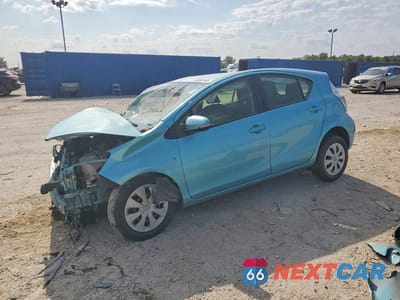 2014 TOYOTA PRIUS C TWO JTDKDTB32E1065052 - główne zdjęcie licytacji z USA - miniatura