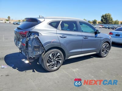 Trzecie zdjęcie samochodu z tyłu: 2019 HYUNDAI TUCSON SPORT VIN:KM8J33AL6KU041147 - miniatura