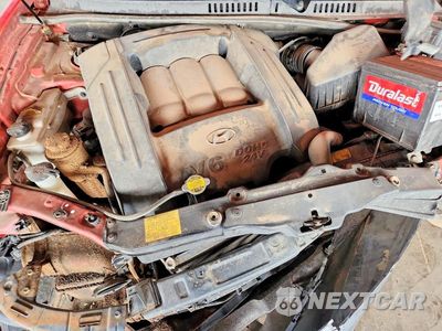 Zdjęcie 12 z 13 samochodu: 2004 HYUNDAI SANTA FE GLS VIN:KM8SC13D94U855164 - miniatura