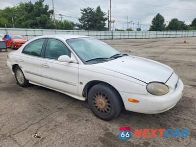 Czwarte zdjęcie samochodu z boku: 1999 MERCURY SABLE LS VIN:1MEFM53S6XA613462 - miniatura