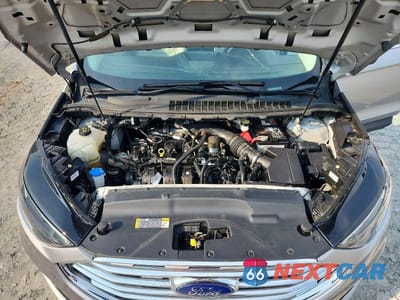 Zdjęcie 12 z 13 samochodu: 2022 FORD EDGE TITANIUM VIN:2FMPK4K94NBA55595 - miniatura