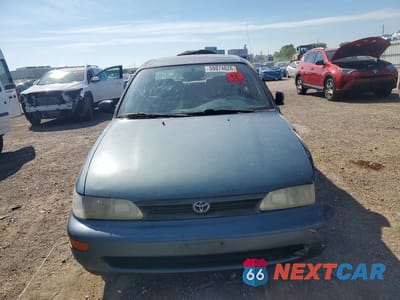 Piąte zdjęcie samochodu w środku: 1994 TOYOTA COROLLA DX VIN:1NXAE09B0RZ209895 - miniatura