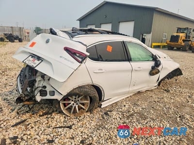 Trzecie zdjęcie samochodu z tyłu: 2020 ALFA ROMEO STELVIO TI VIN:ZASPAKBN7L7C85752 - miniatura