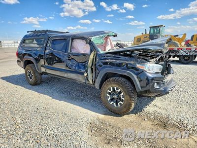 Czwarte zdjęcie samochodu z boku: 2019 TOYOTA TACOMA TRD OFF-ROAD VIN:3TMDZ5BN5KM079761 - miniatura