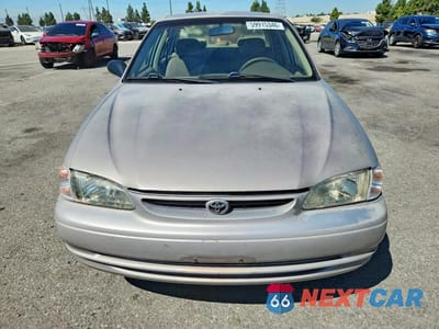 Piąte zdjęcie samochodu w środku: 1999 TOYOTA COROLLA VE VIN:1NXBR12E1XZ140053 - miniatura