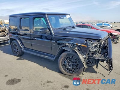 Czwarte zdjęcie samochodu z boku: 2025 MERCEDES-BENZ G 580E VIN:W1NWM0AB3SX025735 - miniatura