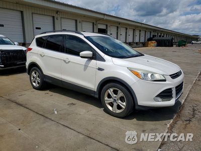 Czwarte zdjęcie samochodu z boku: 2016 FORD ESCAPE SE VIN:1FMCU0GX8GUB82145 - miniatura