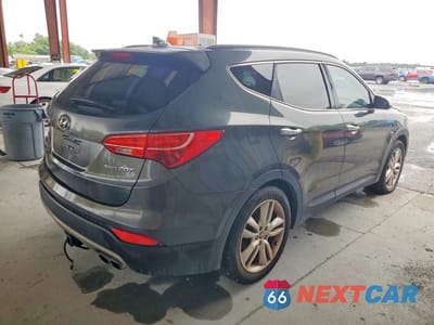 Trzecie zdjęcie samochodu z tyłu: 2014 HYUNDAI SANTA FE SPORT 2.0T VIN:5XYZU3LA5EG194253 - miniatura