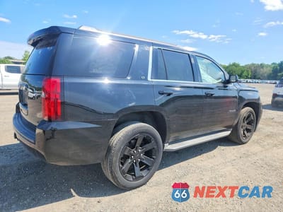 Trzecie zdjęcie samochodu z tyłu: 2015 CHEVROLET TAHOE K1500 LT VIN:1GNSKBKC4FR125553 - miniatura