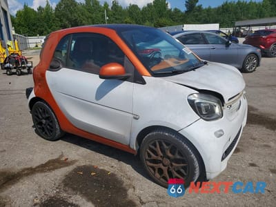 Czwarte zdjęcie samochodu z boku: 2016 SMART FORTWO VIN:WMEFJ5DA3GK068848 - miniatura