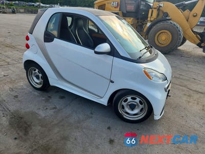 Czwarte zdjęcie samochodu z boku: 2015 SMART FORTWO PURE VIN:WMEEJ3BA9FK806315 - miniatura