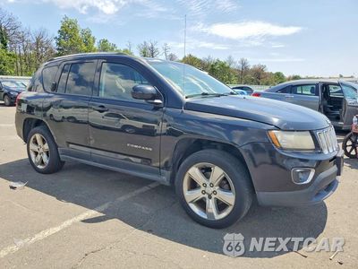 Czwarte zdjęcie samochodu z boku: 2014 JEEP COMPASS LIMITED VIN:1C4NJDCBXED700924 - miniatura