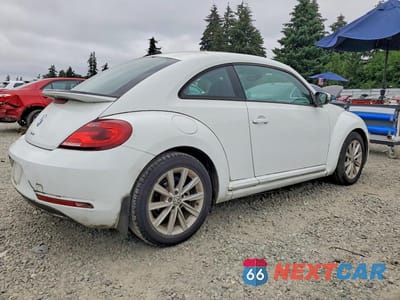 Trzecie zdjęcie samochodu z tyłu: 2017 VOLKSWAGEN BEETLE SE VIN:3VWJ17AT6HM606671 - miniatura