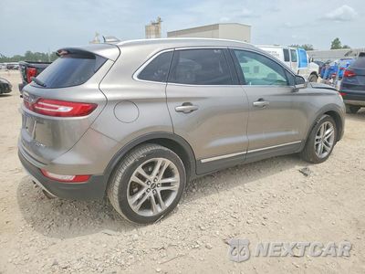 Trzecie zdjęcie samochodu z tyłu: 2016 LINCOLN MKZ VIN:5LMCH3D93GUH19984 - miniatura