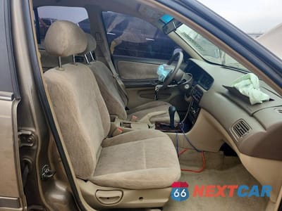 Zdjęcie 7 z 13 samochodu: 1999 NISSAN ALTIMA XE VIN:1N4DL01D5XC124340 - miniatura
