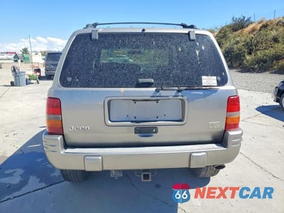 Zdjęcie 6 z 13 samochodu: 1998 JEEP GRAND CHEROKEE LIMITED 5.9L VIN:1J4GZ88Z3WC162700 - miniatura