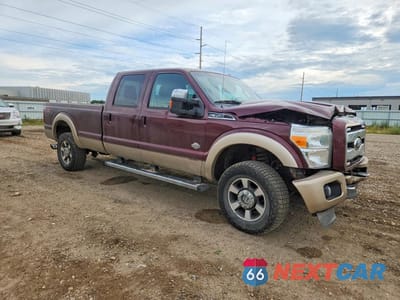 Czwarte zdjęcie samochodu z boku: 2011 FORD F350 SUPER DUTY VIN:1FT8W3BT0BEC30220 - miniatura
