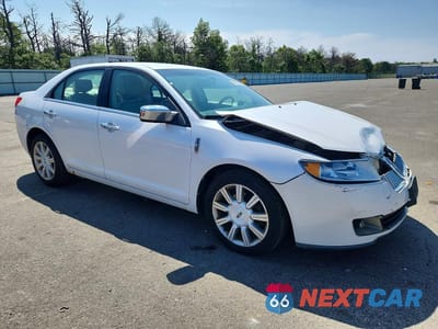 Czwarte zdjęcie samochodu z boku: 2011 LINCOLN MKZ VIN:3LNHL2GC3BR765398 - miniatura