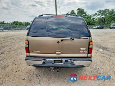 Zdjęcie 6 z 13 samochodu: 2004 GMC YUKON VIN:1GKEK13Z84J190313 - miniatura