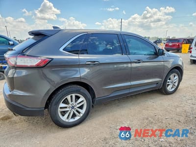 Trzecie zdjęcie samochodu z tyłu: 2015 FORD EDGE SEL VIN:2FMTK3J91FBC17310 - miniatura