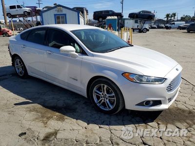 Czwarte zdjęcie samochodu z boku: 2016 FORD FUSION SE HYBRID VIN:3FA6P0LU3GR354776 - miniatura