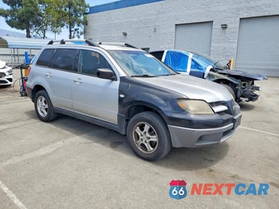 Czwarte zdjęcie samochodu z boku: 2003 MITSUBISHI OUTLANDER LS VIN:JA4LX31G93U029316 - miniatura