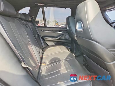 Zdjęcie 11 z 13 samochodu: 2018 BMW X5 M VIN:5YMKT6C5XJ0X21364 - miniatura