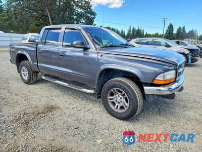 Czwarte zdjęcie samochodu z boku: 2004 DODGE DAKOTA QUAD SLT VIN:1D7HG48N64S718366 - miniatura