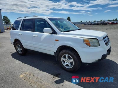 Czwarte zdjęcie samochodu z boku: 2006 HONDA PILOT EX VIN:2HKYF18786H548171 - miniatura