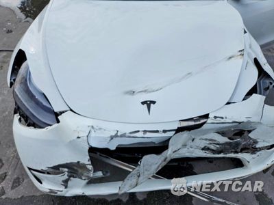 Zdjęcie 12 z 13 samochodu: 2024 TESLA MODEL Y VIN:7SAYGDED7RF102592 - miniatura