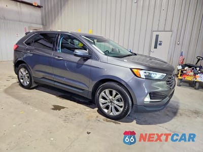 Czwarte zdjęcie samochodu z boku: 2023 FORD EDGE TITANIUM VIN:2FMPK4K92PBA60006 - miniatura