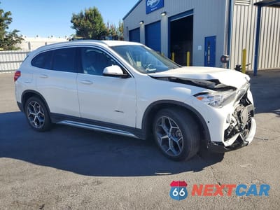 Czwarte zdjęcie samochodu z boku: 2017 BMW X1 XDRIVE28I VIN:WBXHT3C3XH5F68231 - miniatura