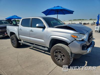 Czwarte zdjęcie samochodu z boku: 2019 TOYOTA TACOMA SR VIN:5TFAX5GN1KX157724 - miniatura