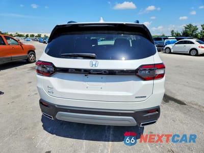 Zdjęcie 6 z 13 samochodu: 2025 HONDA PILOT TOURING VIN:5FNYG1H78SB170603 - miniatura