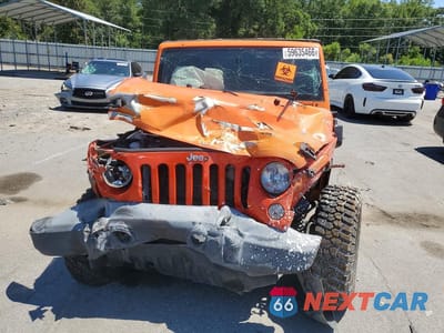 Piąte zdjęcie samochodu w środku: 2015 JEEP WRANGLER UNLIMITED SPORT VIN:1C4BJWDG1FL674438 - miniatura