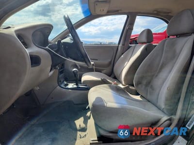 Zdjęcie 7 z 13 samochodu: 1997 HYUNDAI ELANTRA BASE VIN:KMHJF24M0VU594077 - miniatura