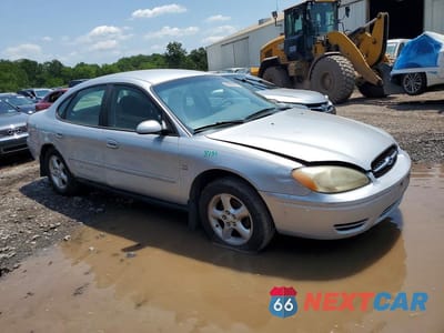 Czwarte zdjęcie samochodu z boku: 2001 FORD TAURUS SES VIN:1FAFP55S01A150222 - miniatura