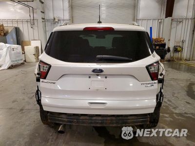 Zdjęcie 6 z 14 samochodu: 2017 FORD ESCAPE TITANIUM VIN:1FMCU9J90HUD71081 - miniatura