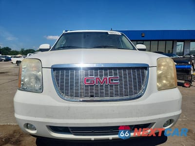 Piąte zdjęcie samochodu w środku: 2011 GMC YUKON SLT VIN:1GKS2CE02BR247701 - miniatura