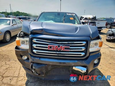 Piąte zdjęcie samochodu w środku: 2016 GMC CANYON SLE VIN:1GTG6CE33G1250032 - miniatura