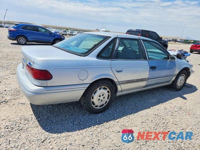 Trzecie zdjęcie samochodu z tyłu: 1995 FORD TAURUS GL/SE VIN:1FALP5244SG323943 - miniatura